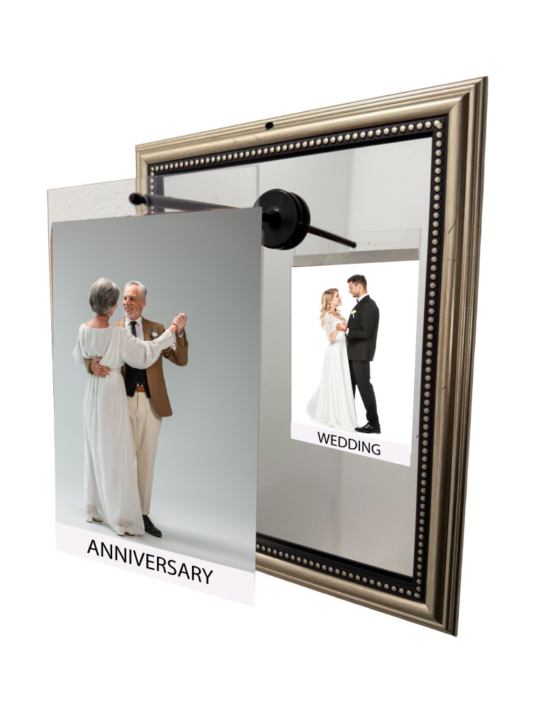 A decorative mirror with two images attached: one labeled 'ANNIVERSARY' showing an older couple dancing, and another labeled 'WEDDING' featuring a younger couple in formal attire.